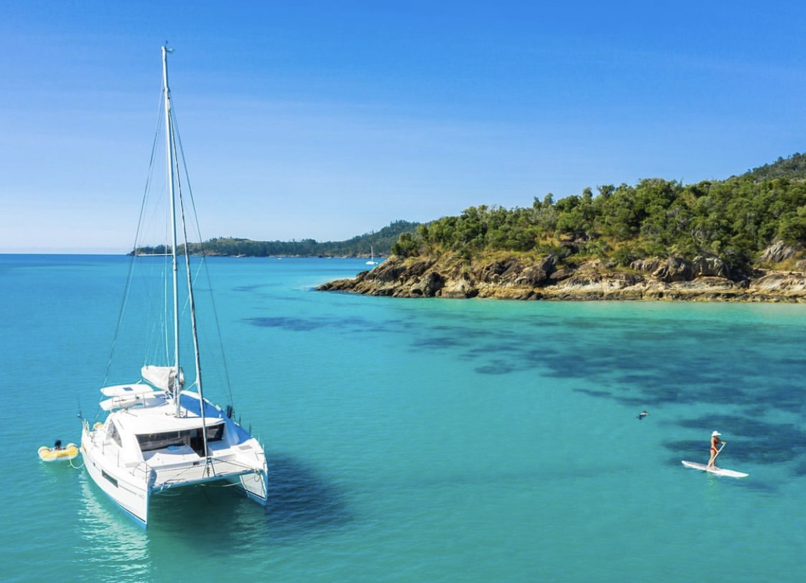 a small boat in a large body of water